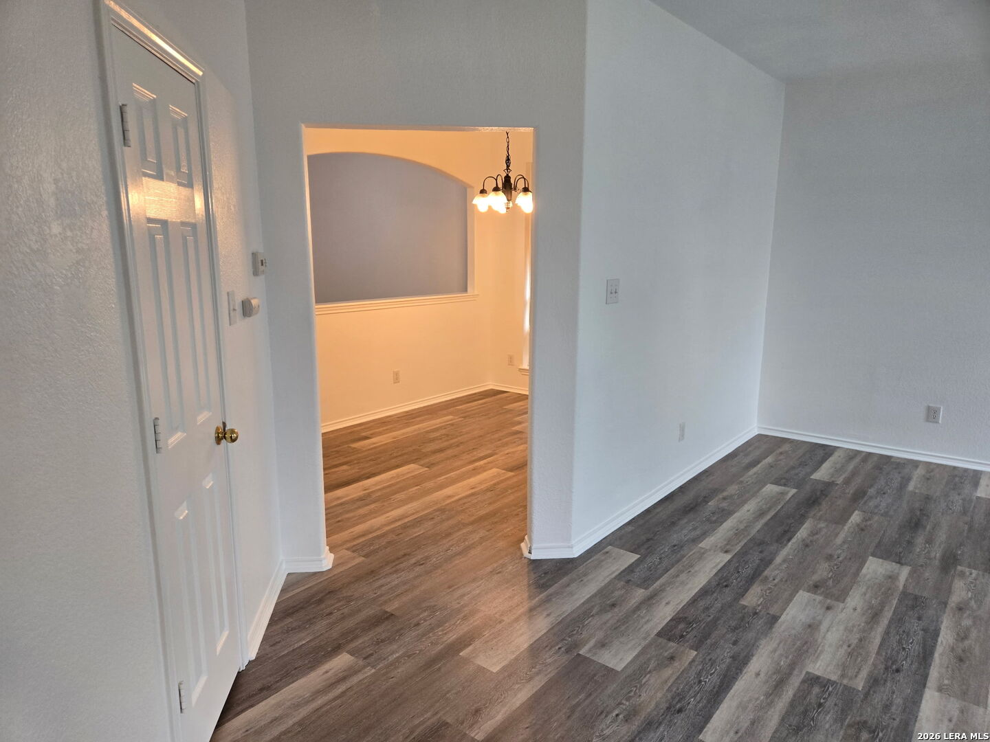 405 Point Valley San Antonio, TX 78253 - Photo 12 of 16 an empty room with wooden floor and windows