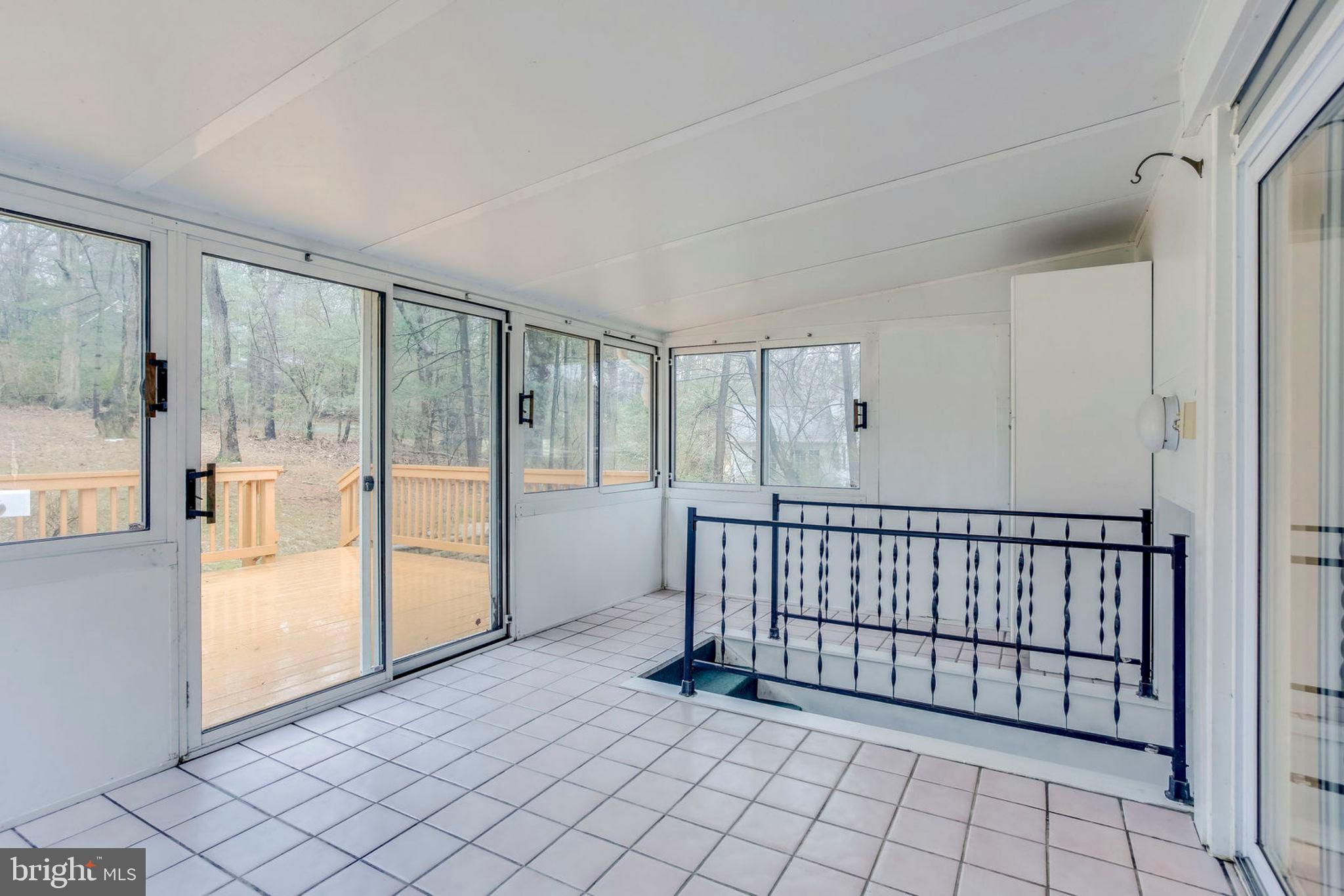 11001 Howland Drive Reston, VA 20191 - Photo 29 of 41 Sun-drenched sunroom