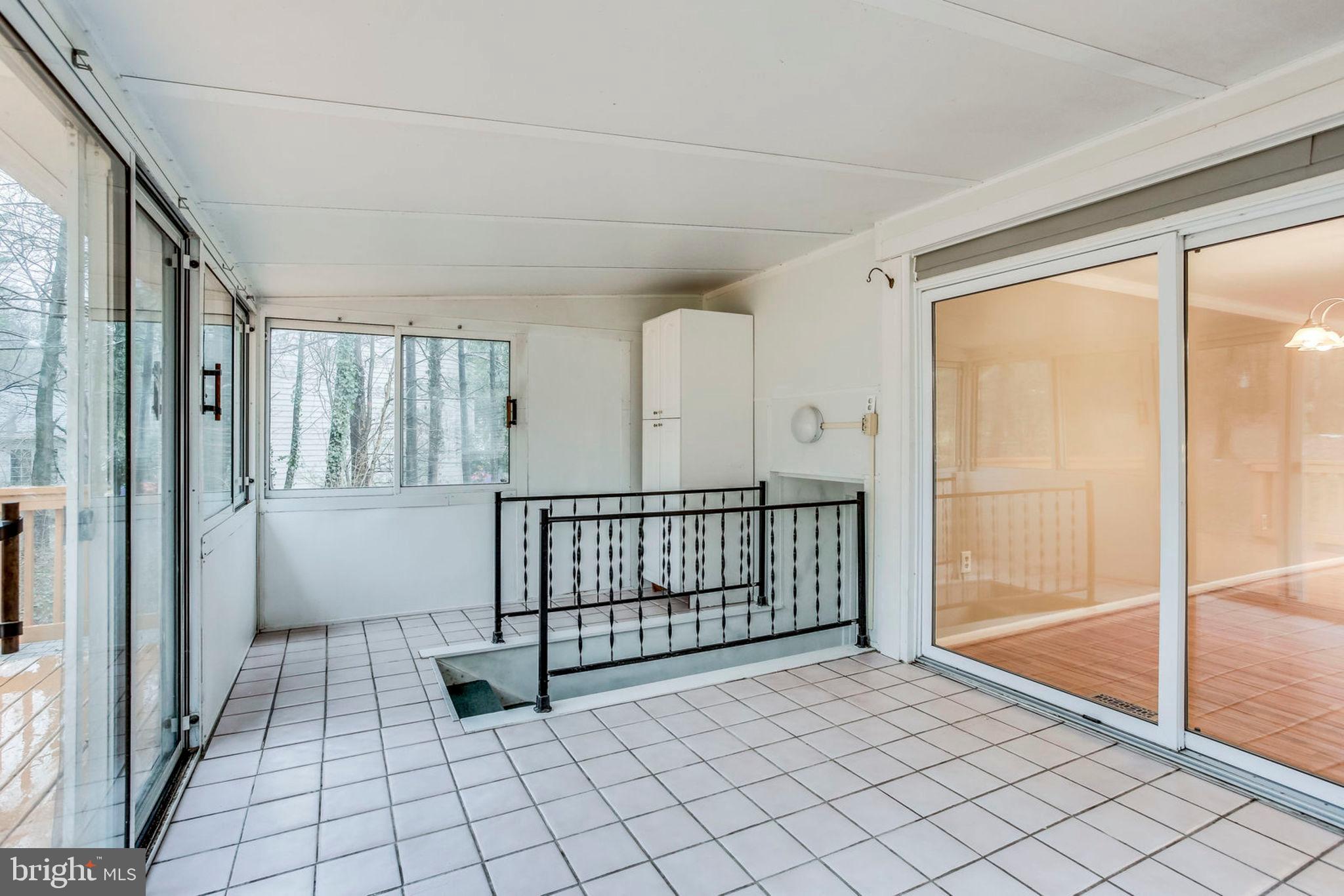 11001 Howland Drive Reston, VA 20191 - Photo 30 of 41 Sunroom with garage access