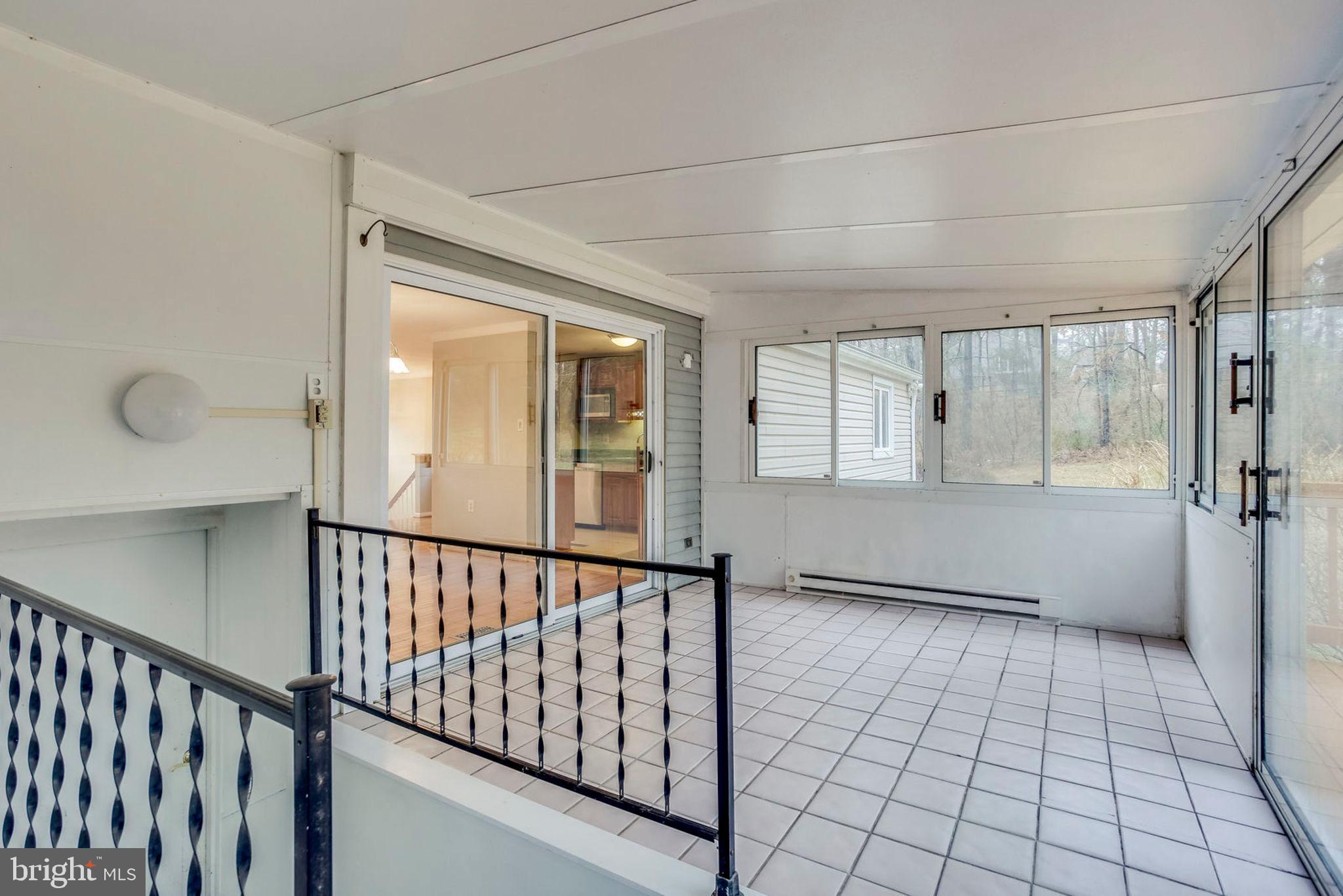 11001 Howland Drive Reston, VA 20191 - Photo 31 of 41 Sliding walk-out door to living area