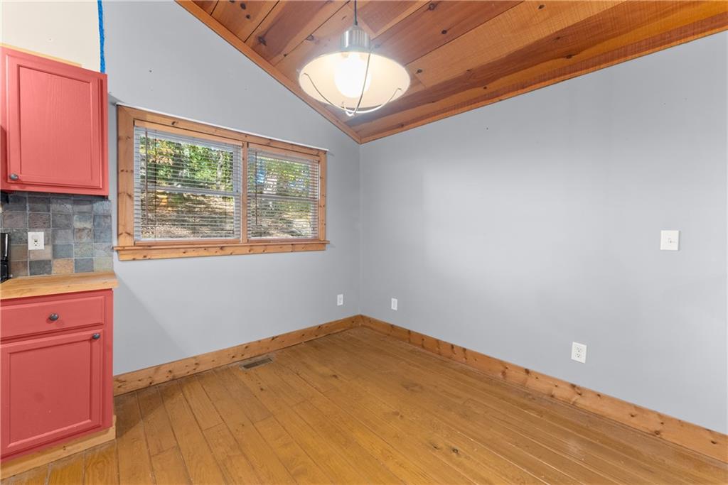 773 Shorewood Circle Toccoa, GA 30577 - Photo 16 of 39 a view of empty room with wooden floor and fan