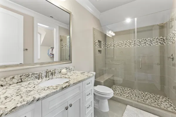 a kitchen with a sink cabinets and window