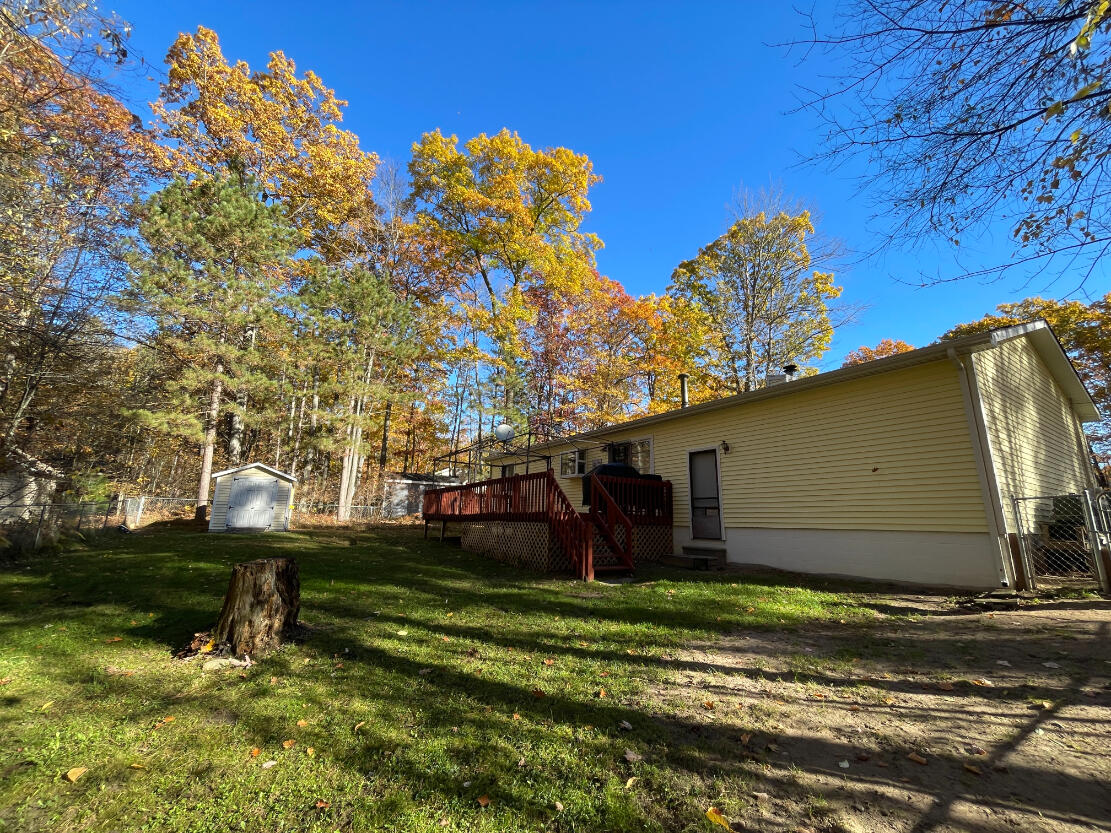 7937 Hillcrest Road Roscommon, MI 48653 - Photo 27 of 34 Fenced Backyard