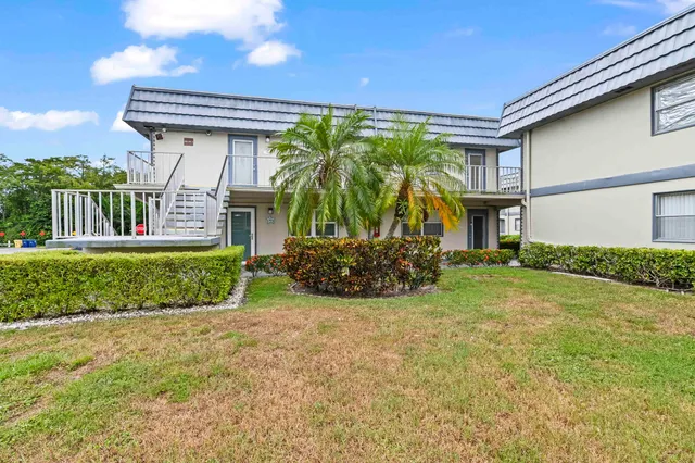 a view of a house with a porch