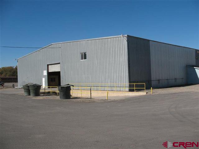 a view of an empty room with a fireplace