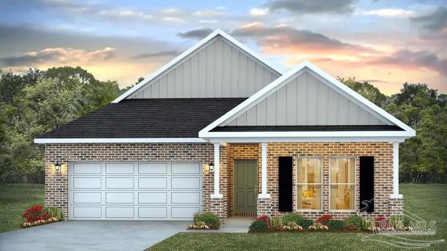 9793 Windy Hill Road Pensacola, FL 32526 - Photo 3 of 36 a front view of a house with garden