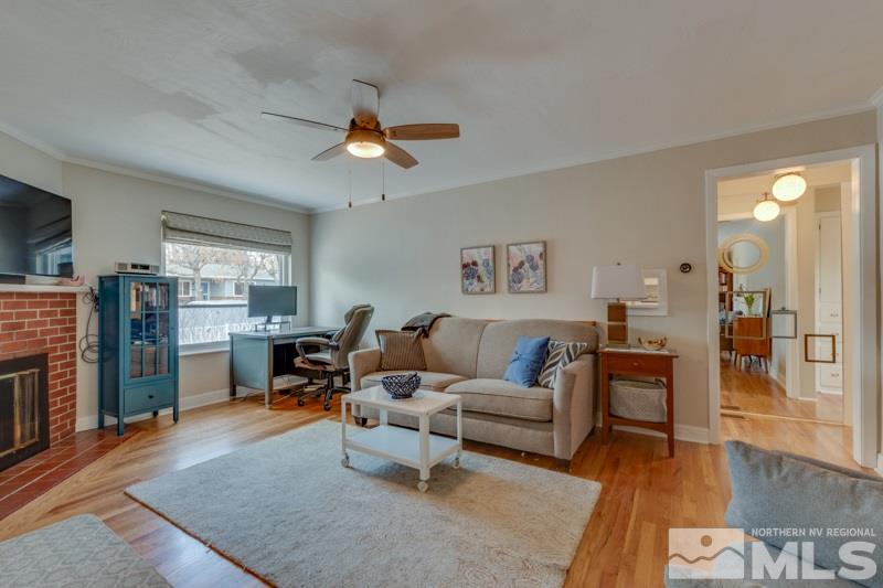 1686 Watt Street Reno, NV 89509 - Photo 8 of 23 a living room with furniture and a fireplace