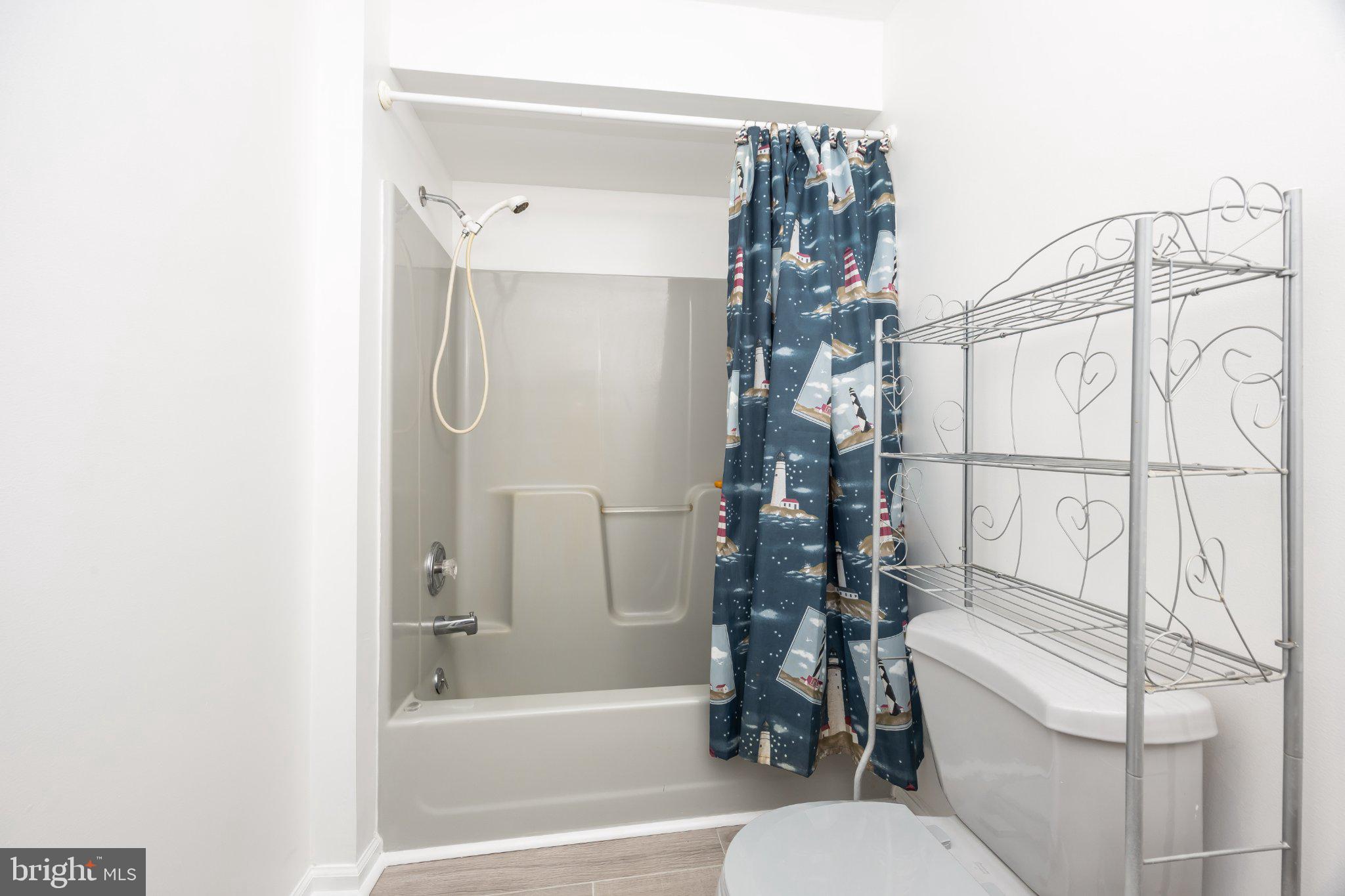 10431 Brighton Road Ocean City, MD 21842 - Photo 10 of 39 Coastal charm in a cozy bathroom.