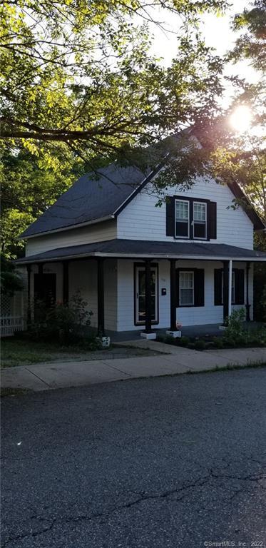 110 Cedar Street Norwich, CT 06360 - Photo 1 of 1 a front view of a house with a yard