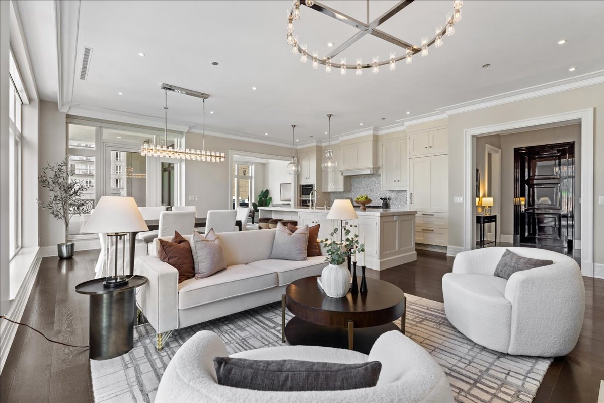 9 West Walton Street, Unit 702 Chicago, IL 60610 - Photo 7 of 38 a living room with furniture and a chandelier