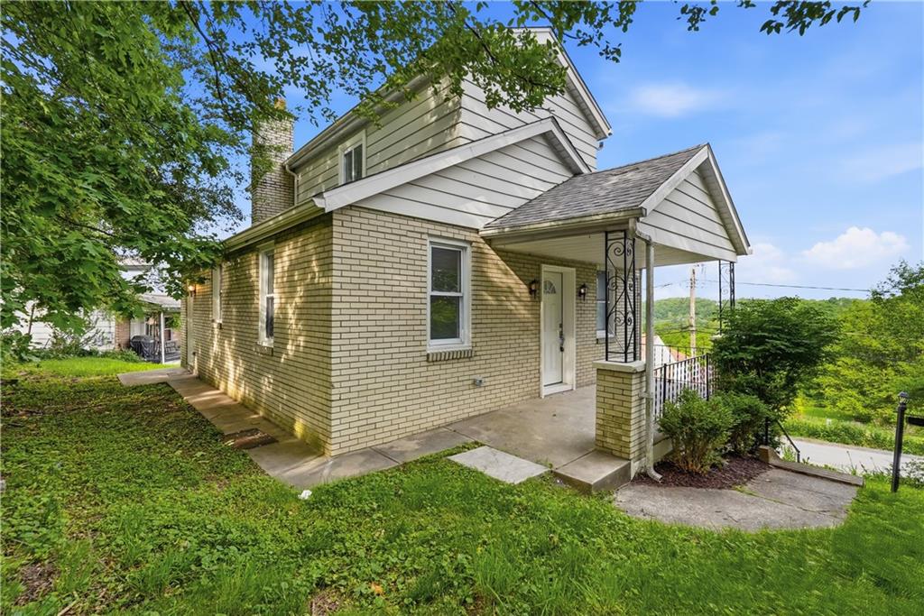 480 Songo Street Pittsburgh, PA 15227 - Photo 4 of 36 front view of a house with a yard