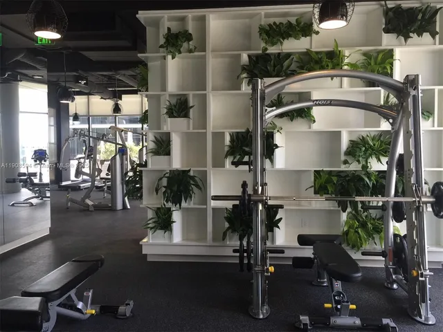 a view of a room with gym equipment