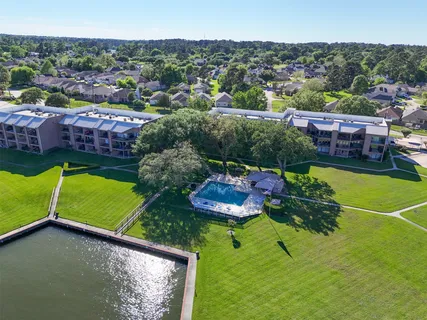 a view of a swimming pool and lounge chair