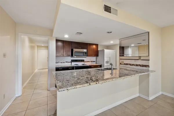 $219,000 | 15575 Marina Drive, Unit 123A, Montgomery, TX 77356