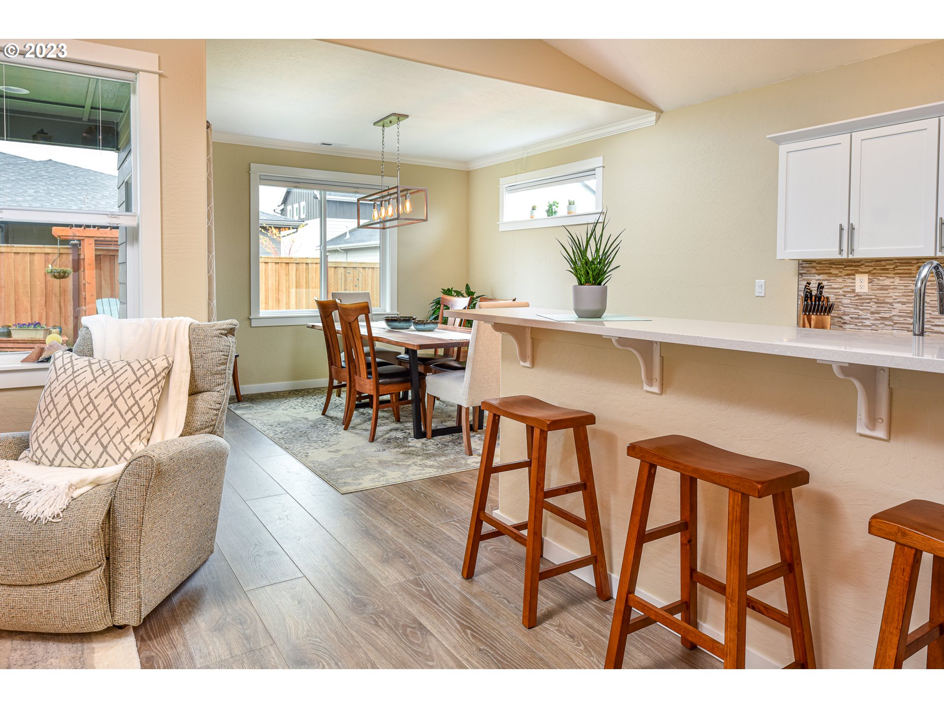 878 Tyson Lane Eugene, OR 97404 - Photo 14 of 39 a living room with furniture and wooden floor