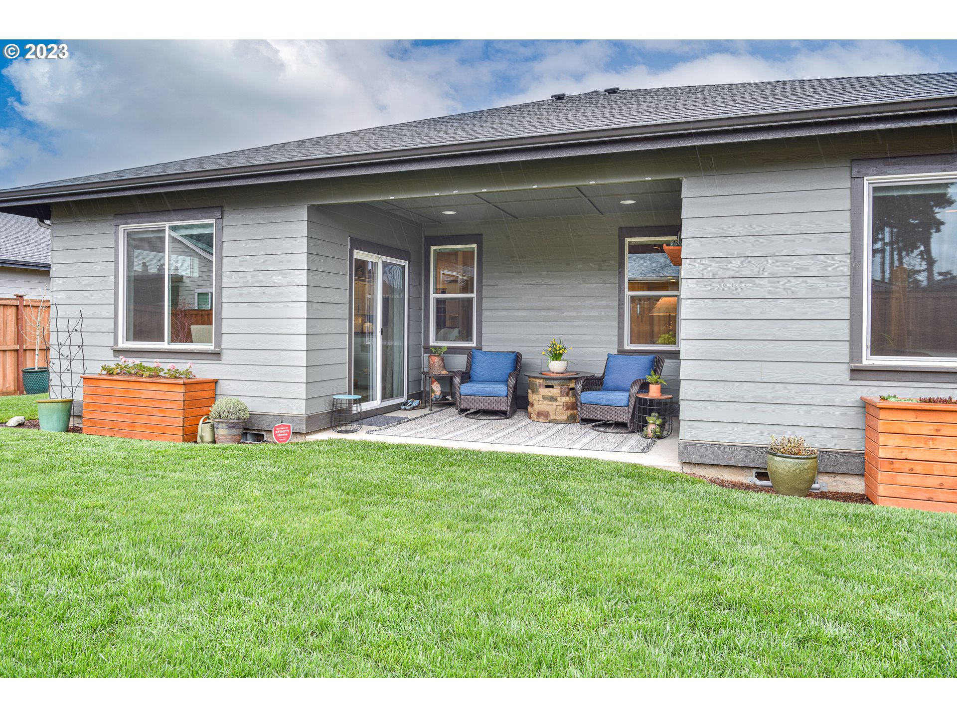 878 Tyson Lane Eugene, OR 97404 - Photo 31 of 39 a view of a house with backyard and porch