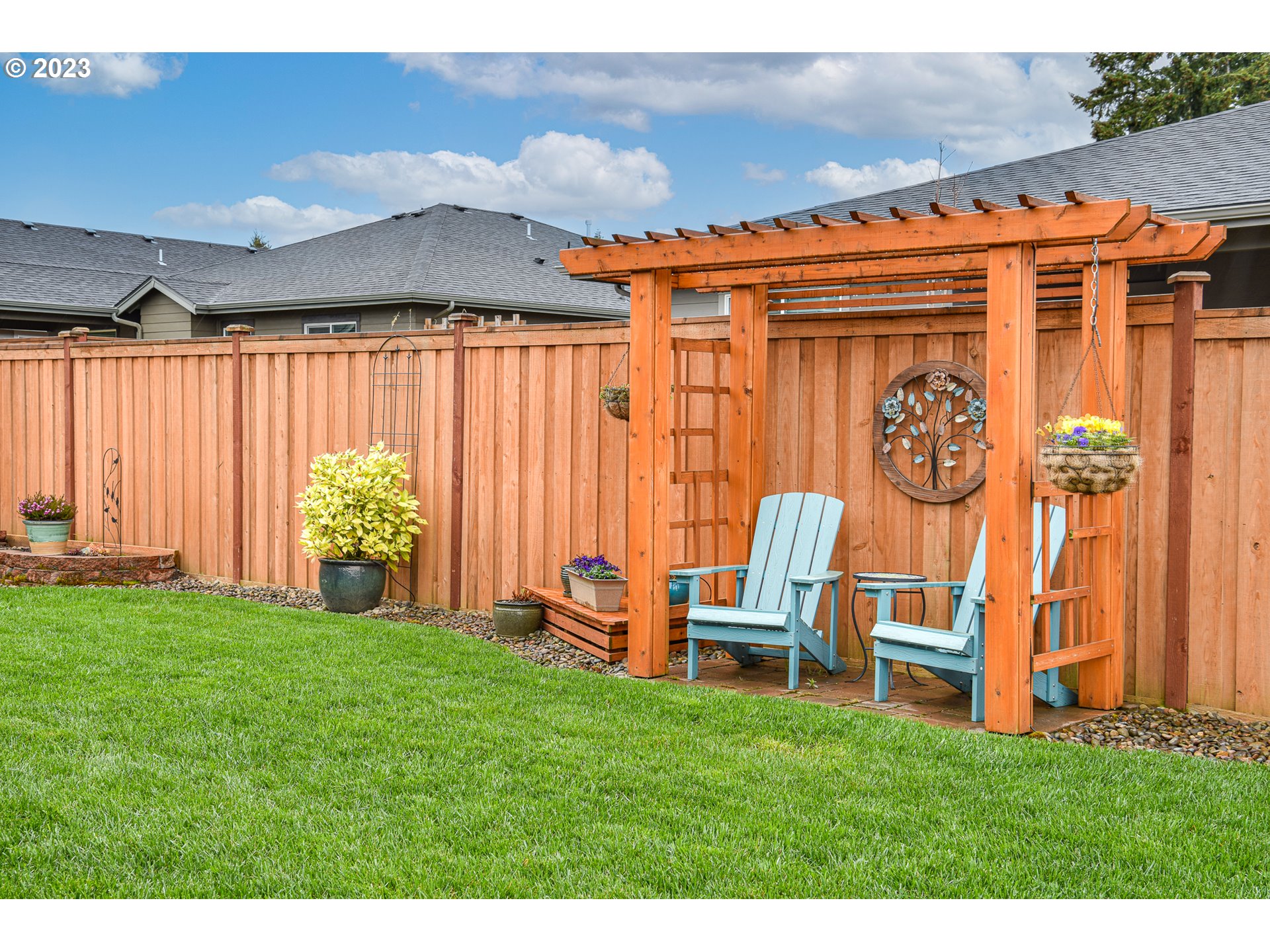 878 Tyson Lane Eugene, OR 97404 - Photo 34 of 39 a backyard of a house with barbeque oven