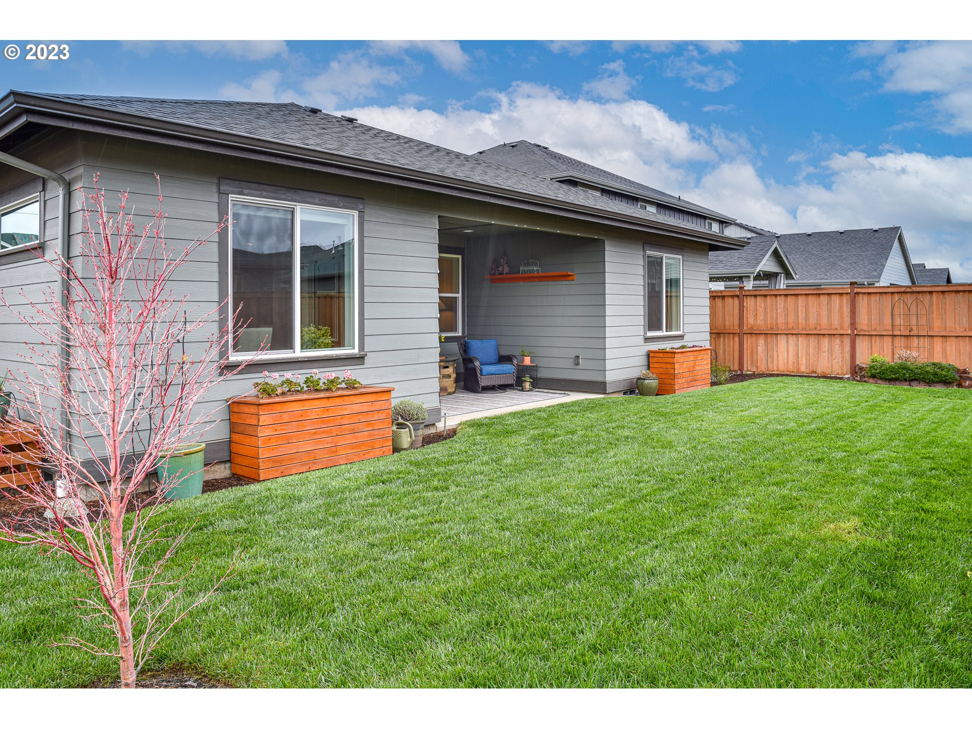878 Tyson Lane Eugene, OR 97404 - Photo 36 of 39 a front view of house with yard and outdoor seating