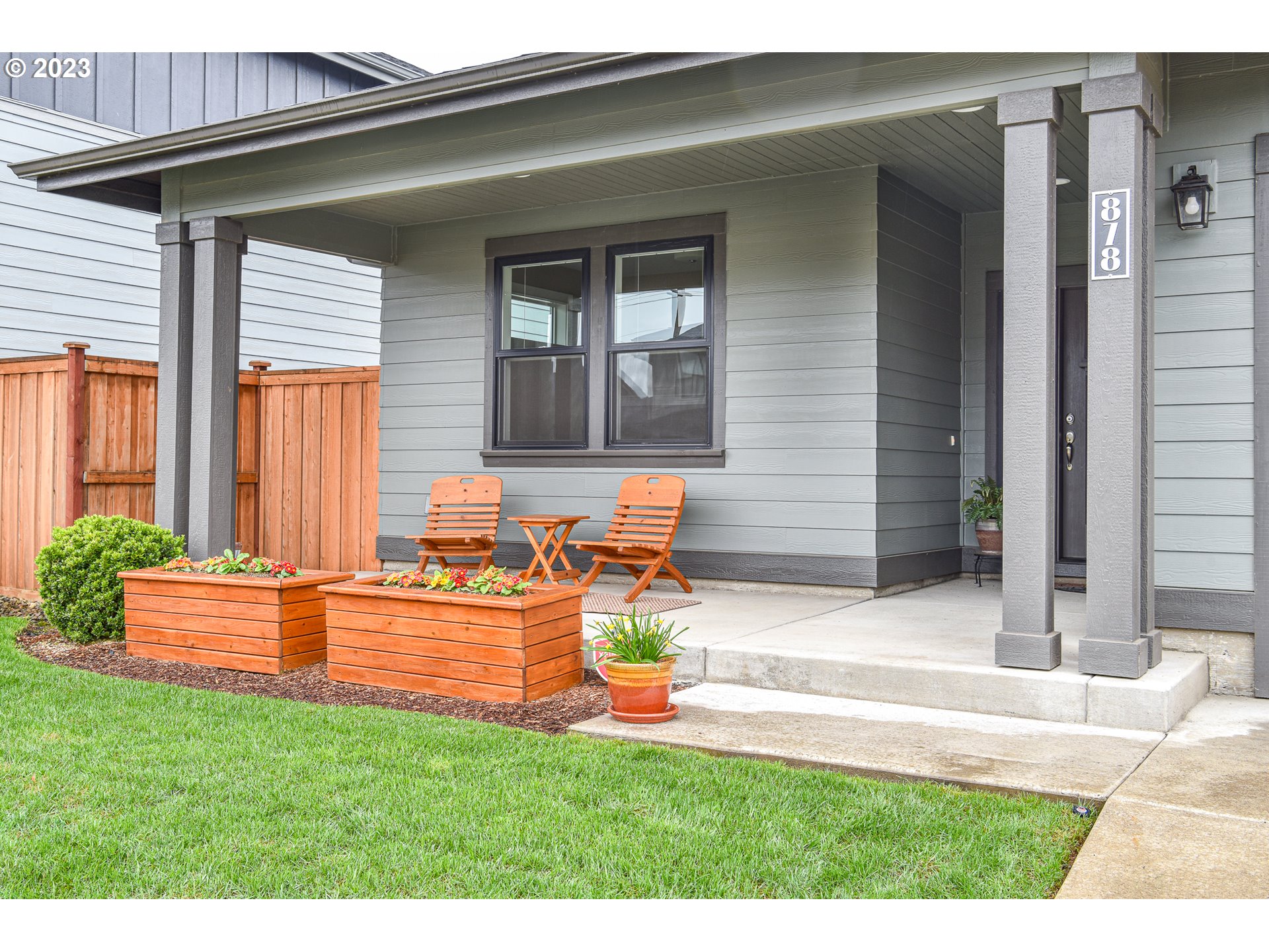 878 Tyson Lane Eugene, OR 97404 - Photo 38 of 39 a view of a house with backyard sitting area and tub