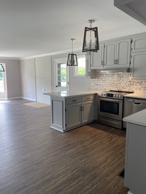 3125 Buffalo Road Lawrenceburg, TN 38464 - Photo 15 of 22 a kitchen with stainless steel appliances granite countertop a sink cabinets and wooden floor