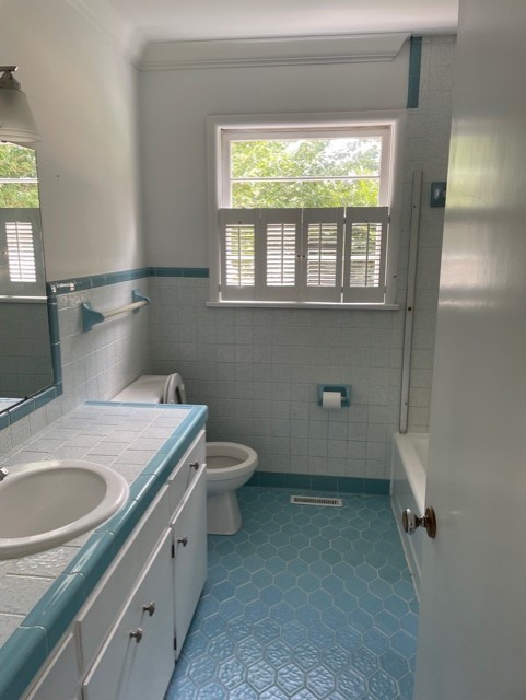 3125 Buffalo Road Lawrenceburg, TN 38464 - Photo 18 of 22 a bathroom with a granite countertop sink a mirror and a toilet
