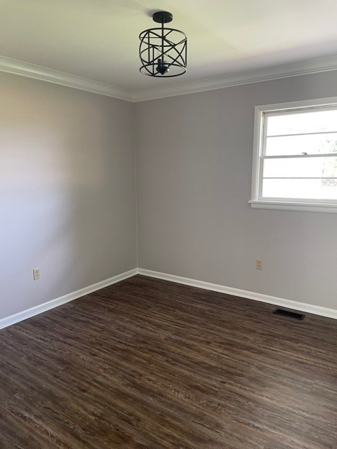 3125 Buffalo Road Lawrenceburg, TN 38464 - Photo 20 of 22 a view of an empty room with wooden floor and a window