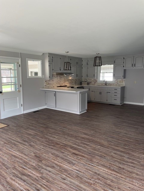 3125 Buffalo Road Lawrenceburg, TN 38464 - Photo 22 of 22 a kitchen with stainless steel appliances a sink cabinets and wooden floor