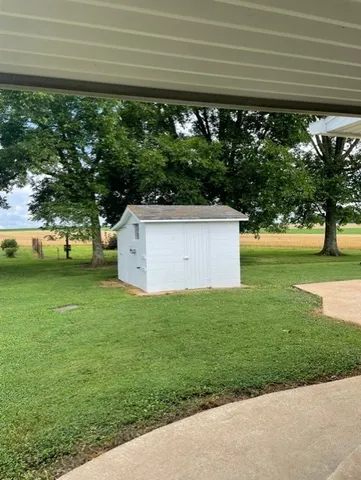 a view of a garden with an outdoor space