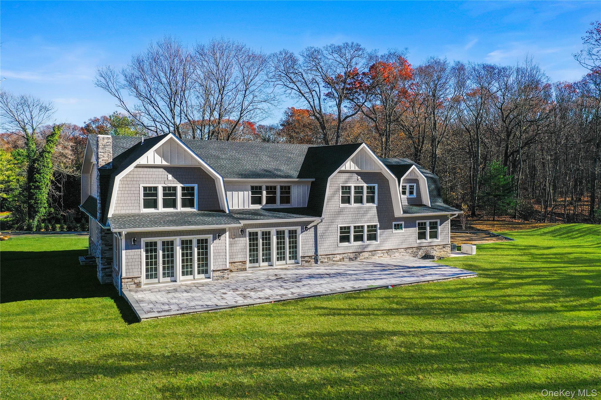541 Split Rock Road Syosset, NY 11791 - Photo 2 of 10 a front view of a house with garden