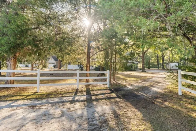 a view of a houses with a yard