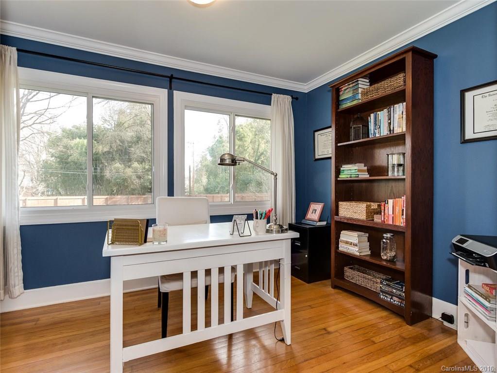 935 Scaleybark Road Charlotte, NC 28209 - Photo 11 of 17 a view of a dining room with furniture window and wooden floor