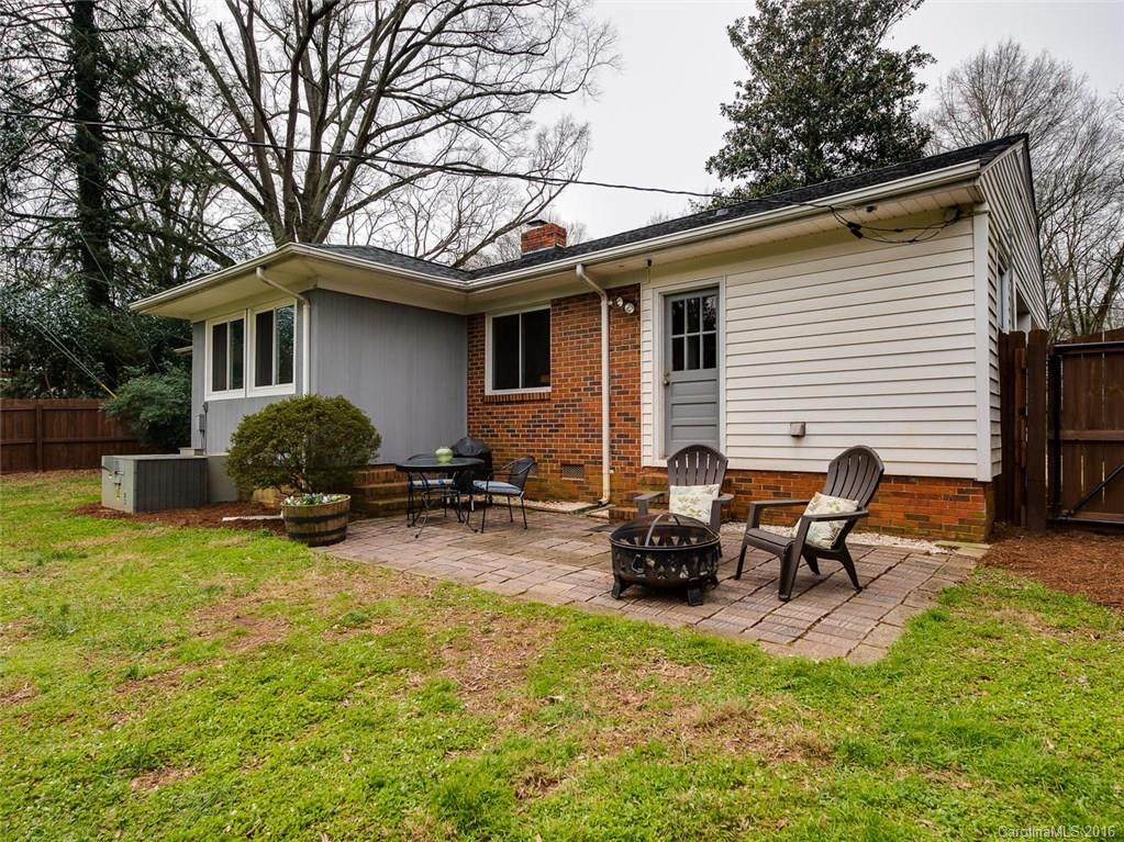 935 Scaleybark Road Charlotte, NC 28209 - Photo 16 of 17 a view of a house with back yard