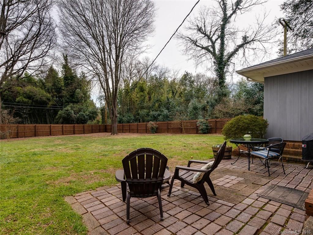 935 Scaleybark Road Charlotte, NC 28209 - Photo 17 of 17 a view of a yard with furniture and a table