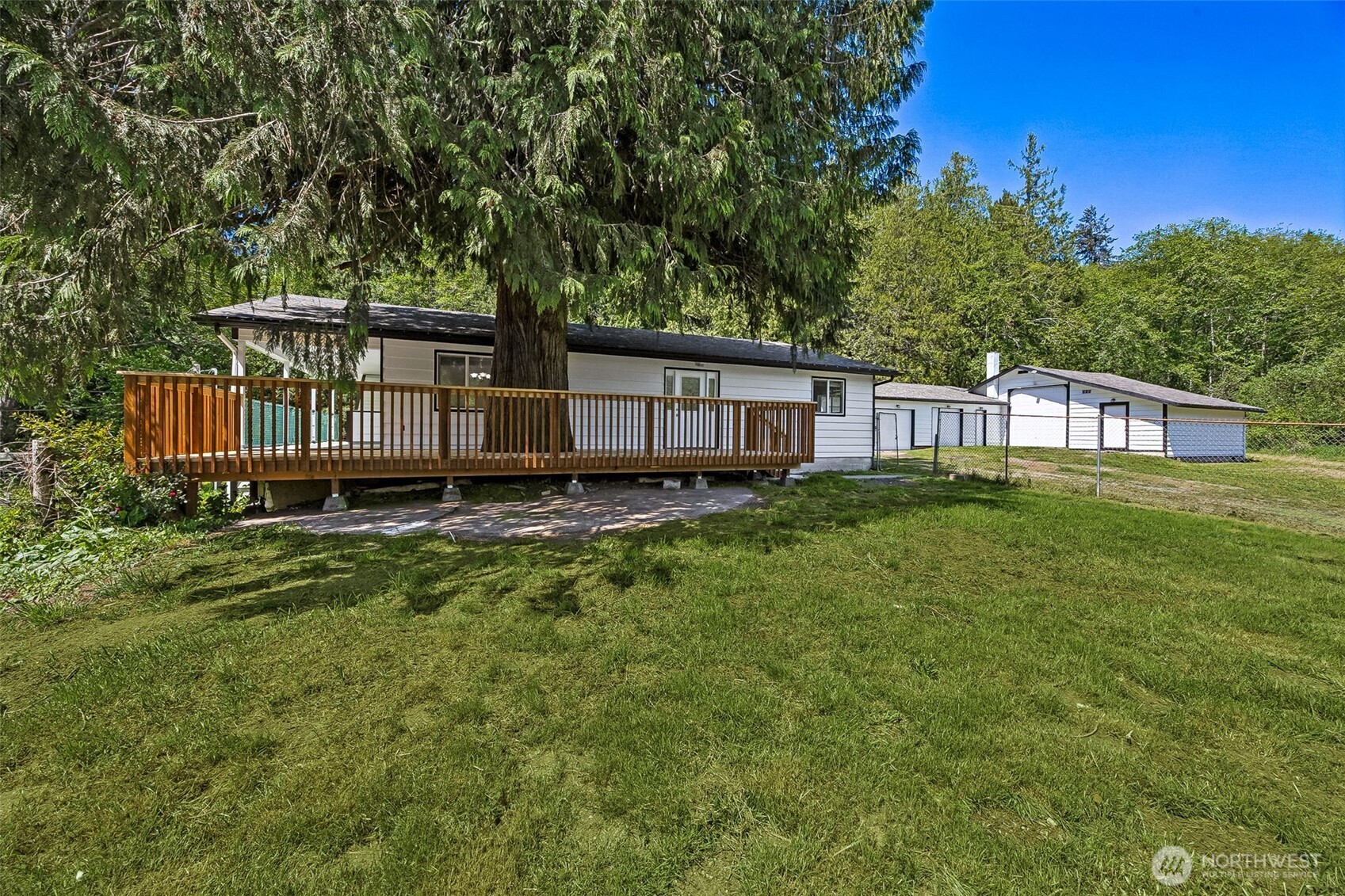 13710 Madrona Road Southwest Port Orchard, WA 98367 - Photo 34 of 40 a view of a house with a yard