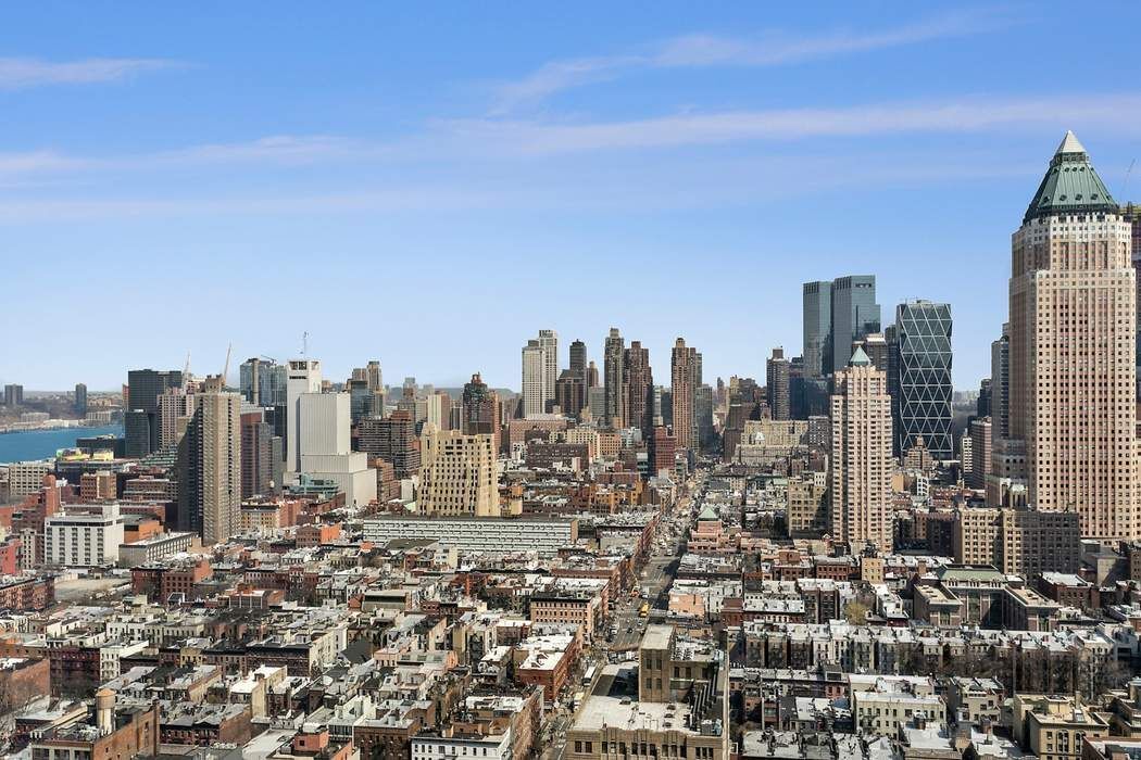 350 West 42nd Street, Unit 36B Manhattan, NY 10036 - Photo 11 of 17 a view of a city with tall buildings in the background