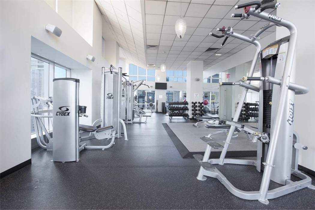 350 West 42nd Street, Unit 36B Manhattan, NY 10036 - Photo 12 of 17 a view of a room with gym equipment