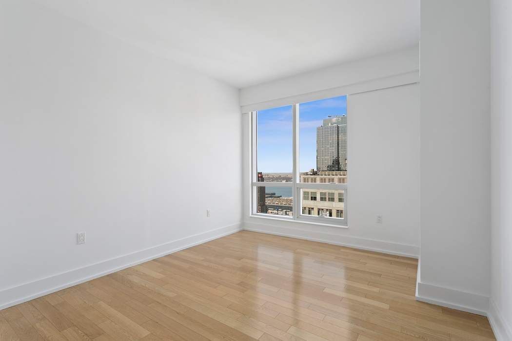 350 West 42nd Street, Unit 36B Manhattan, NY 10036 - Photo 9 of 17 a view of an empty room