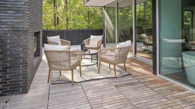 a bedroom with a bed and a table