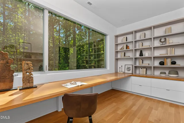 a bathroom with a toilet sink and shower