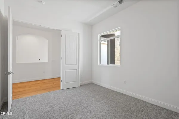 an empty room with closet