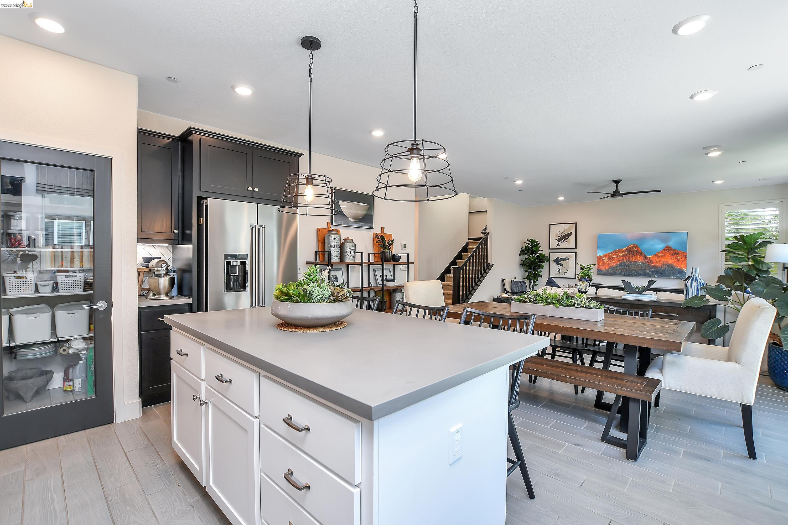 829 Hardcastle Ranch Road Oakley, CA 94561 - Photo 15 of 41 Kitchen island with light-toned countertop and white cabinetry