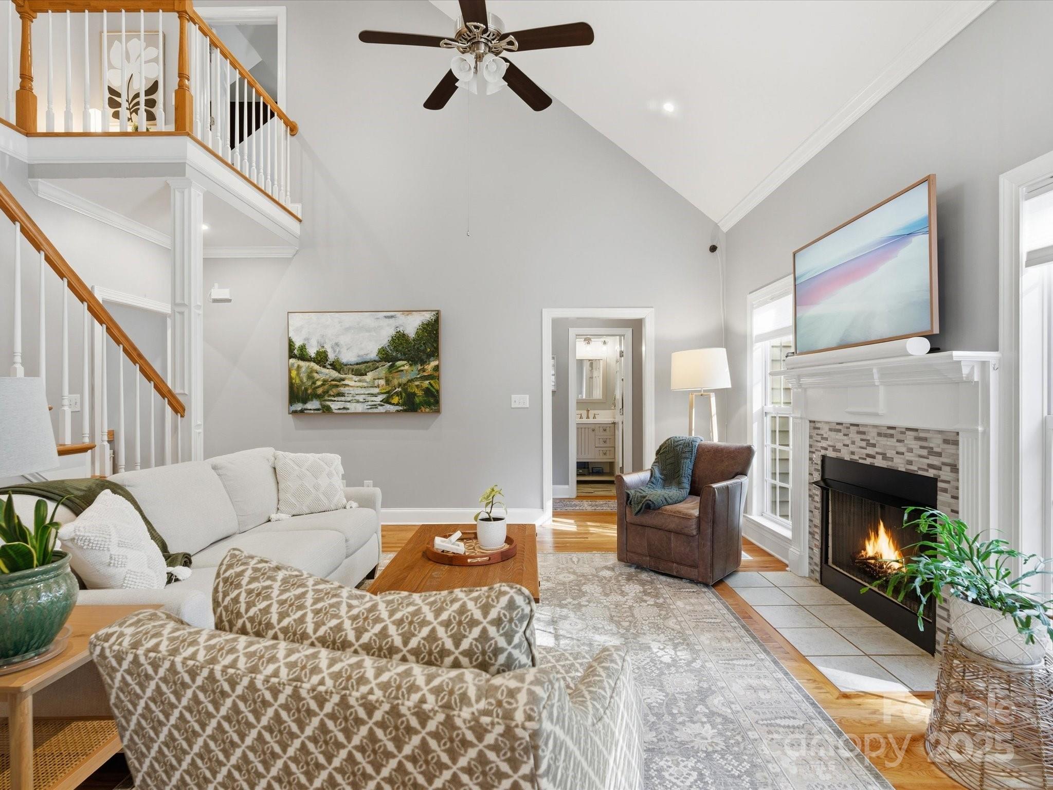 4601 Magnolia Ridge Drive Waxhaw, NC 28173 - Photo 15 of 48 a living room with furniture and a fireplace