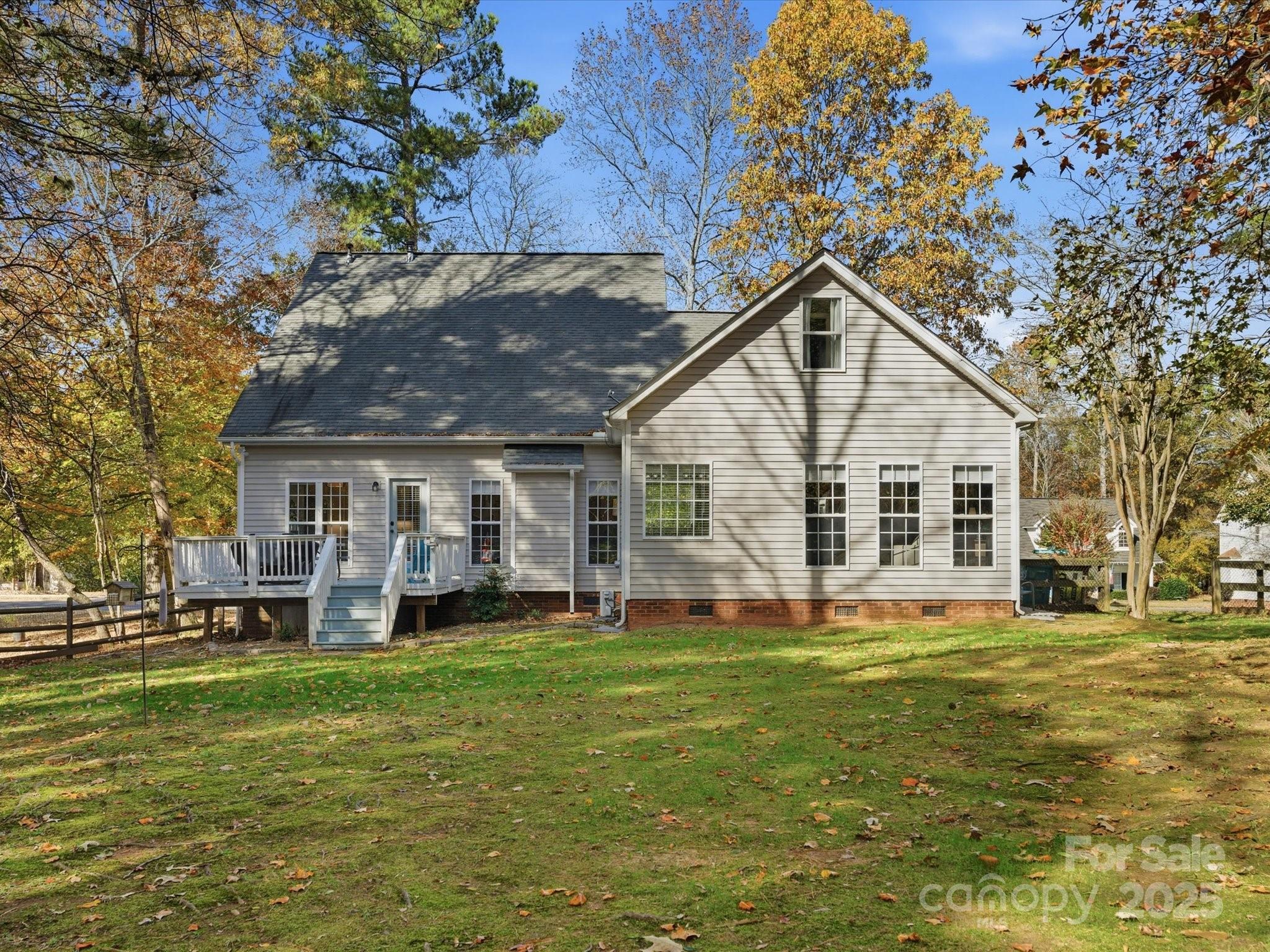 4601 Magnolia Ridge Drive Waxhaw, NC 28173 - Photo 2 of 48 a front view of a house with a garden