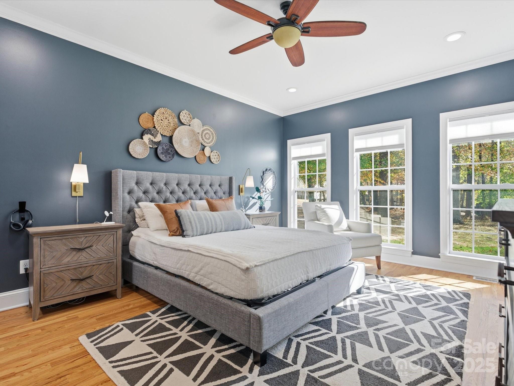 4601 Magnolia Ridge Drive Waxhaw, NC 28173 - Photo 21 of 48 a bedroom with a bed and a large window