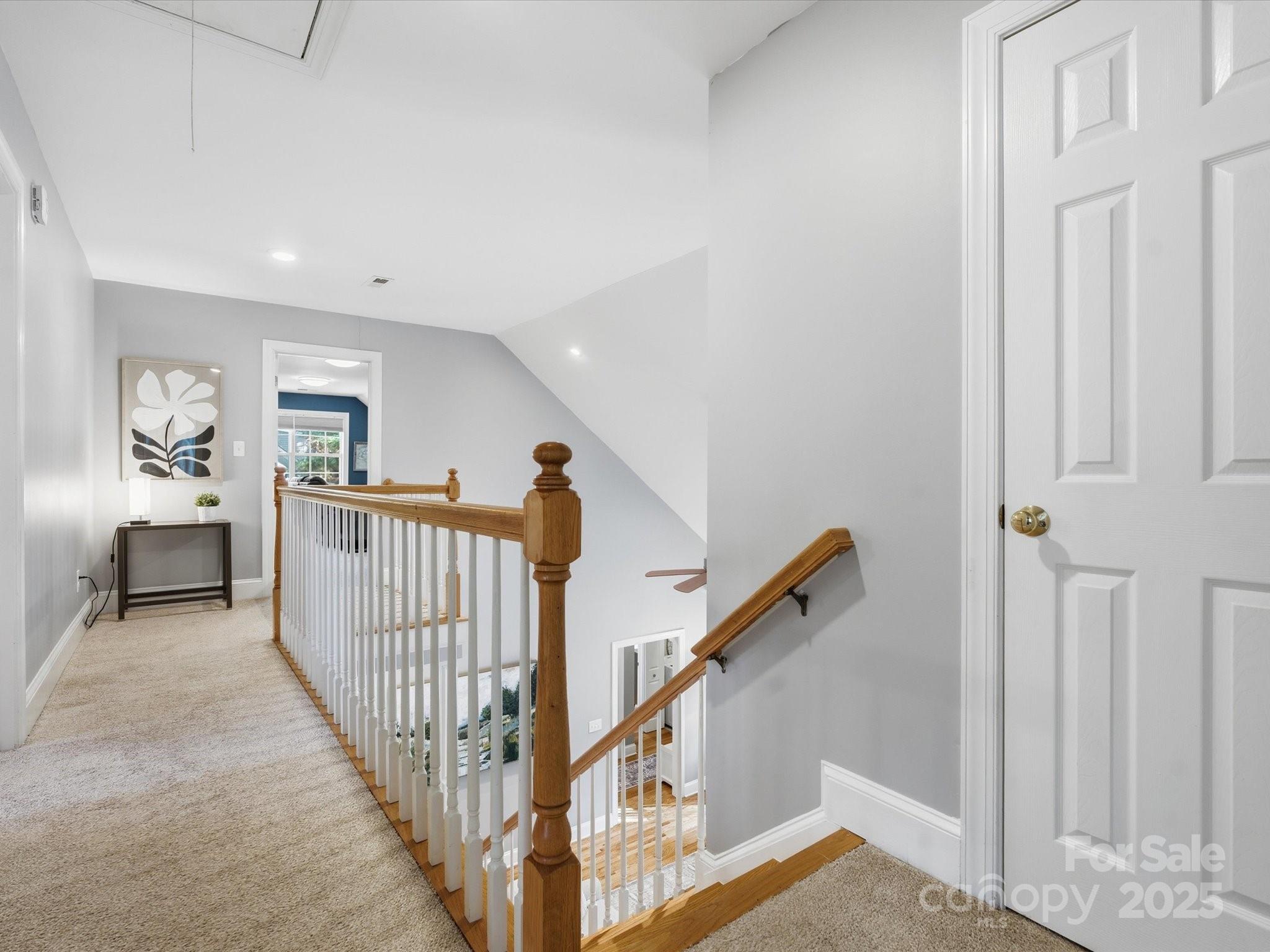 4601 Magnolia Ridge Drive Waxhaw, NC 28173 - Photo 28 of 48 a view of a hallway with stairs