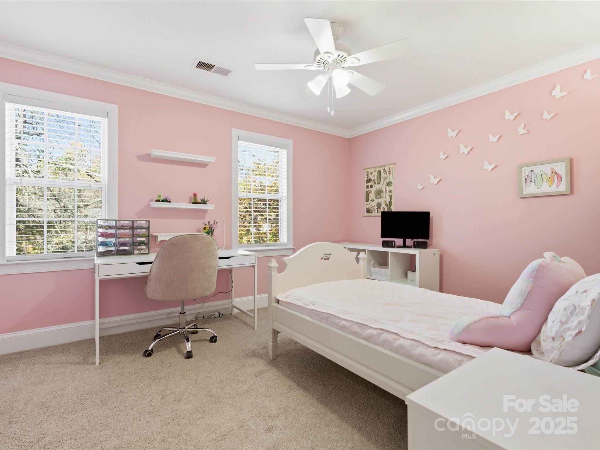 4601 Magnolia Ridge Drive Waxhaw, NC 28173 - Photo 31 of 48 a bedroom with a bed and a chair