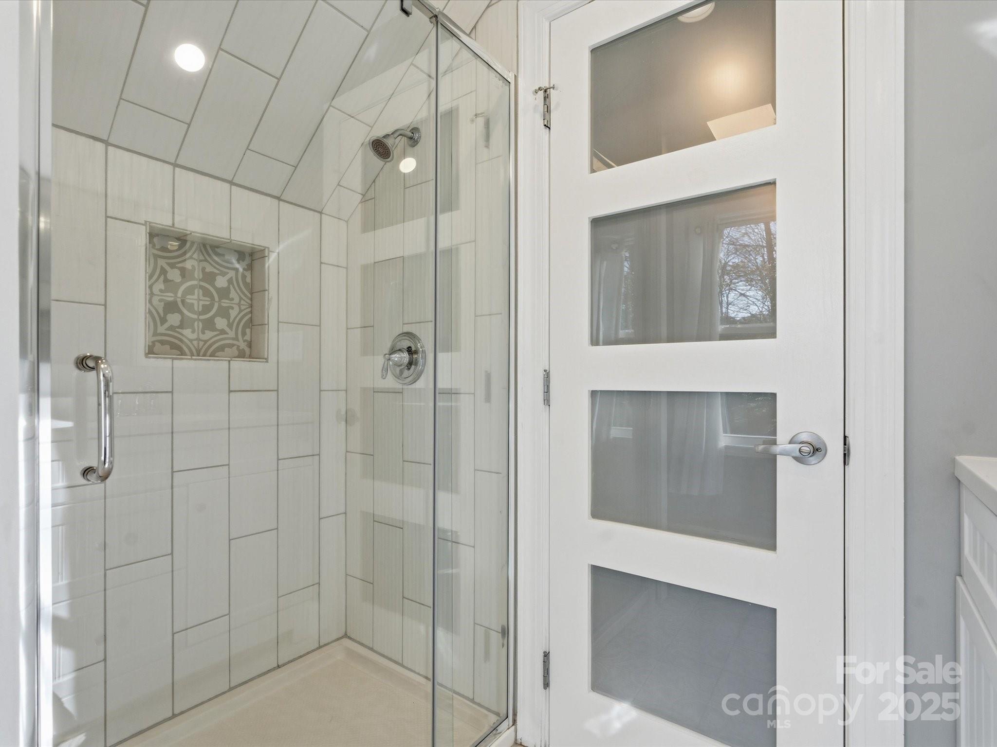 4601 Magnolia Ridge Drive Waxhaw, NC 28173 - Photo 35 of 48 a bathroom with a shower and a sink