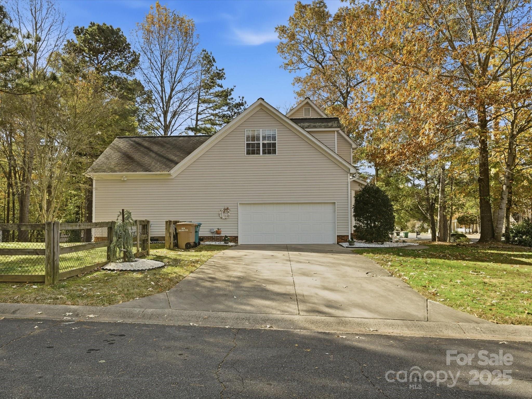 4601 Magnolia Ridge Drive Waxhaw, NC 28173 - Photo 42 of 48 a front view of a house with a yard