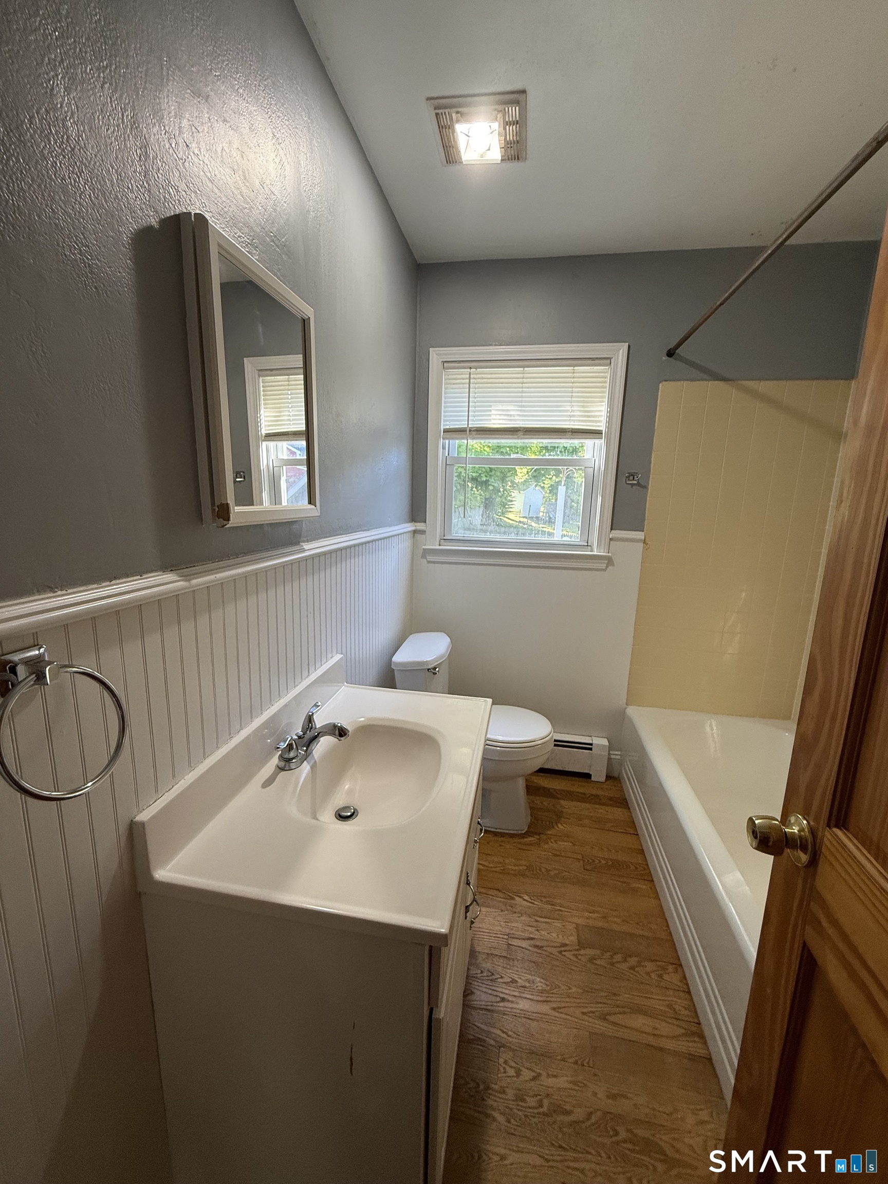 808 East Main Street Torrington, CT 06790 - Photo 22 of 40 a bathroom with a sink and a mirror
