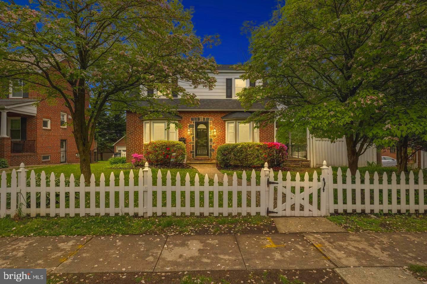 501 Dunkirk Road Baltimore, MD 21212 - Photo 2 of 38 a front view of a house with a garden
